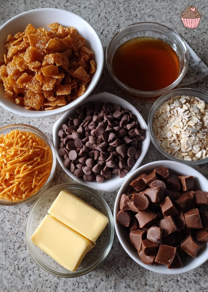Stack of homemade Caramel Chocolate Crunch Bars on a wire rack, showing distinct layers.